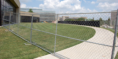 Fenced-In North-South Path Next to Activity Center